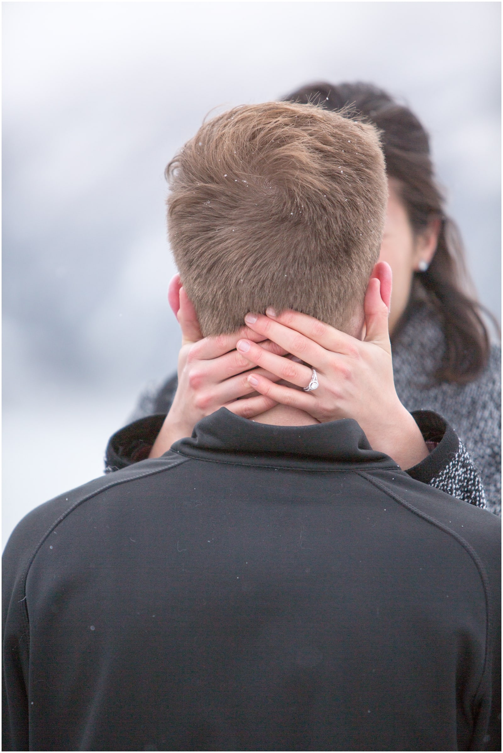 A beautiful adventure engagement session in the Rocky Mountains of Alberta at Barrier Lake, Kananaksis, and Spray Lakes with 360 mountain views and snow