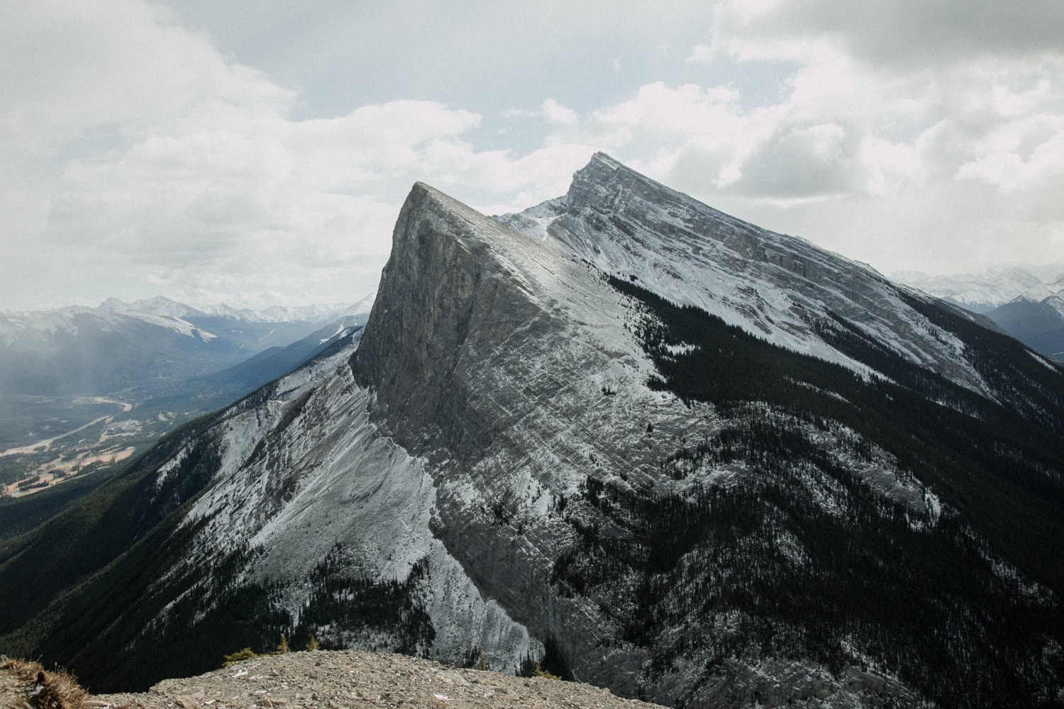 A photo of Rundle Mountain in Banff, Albert as seen from an adjacent mountain