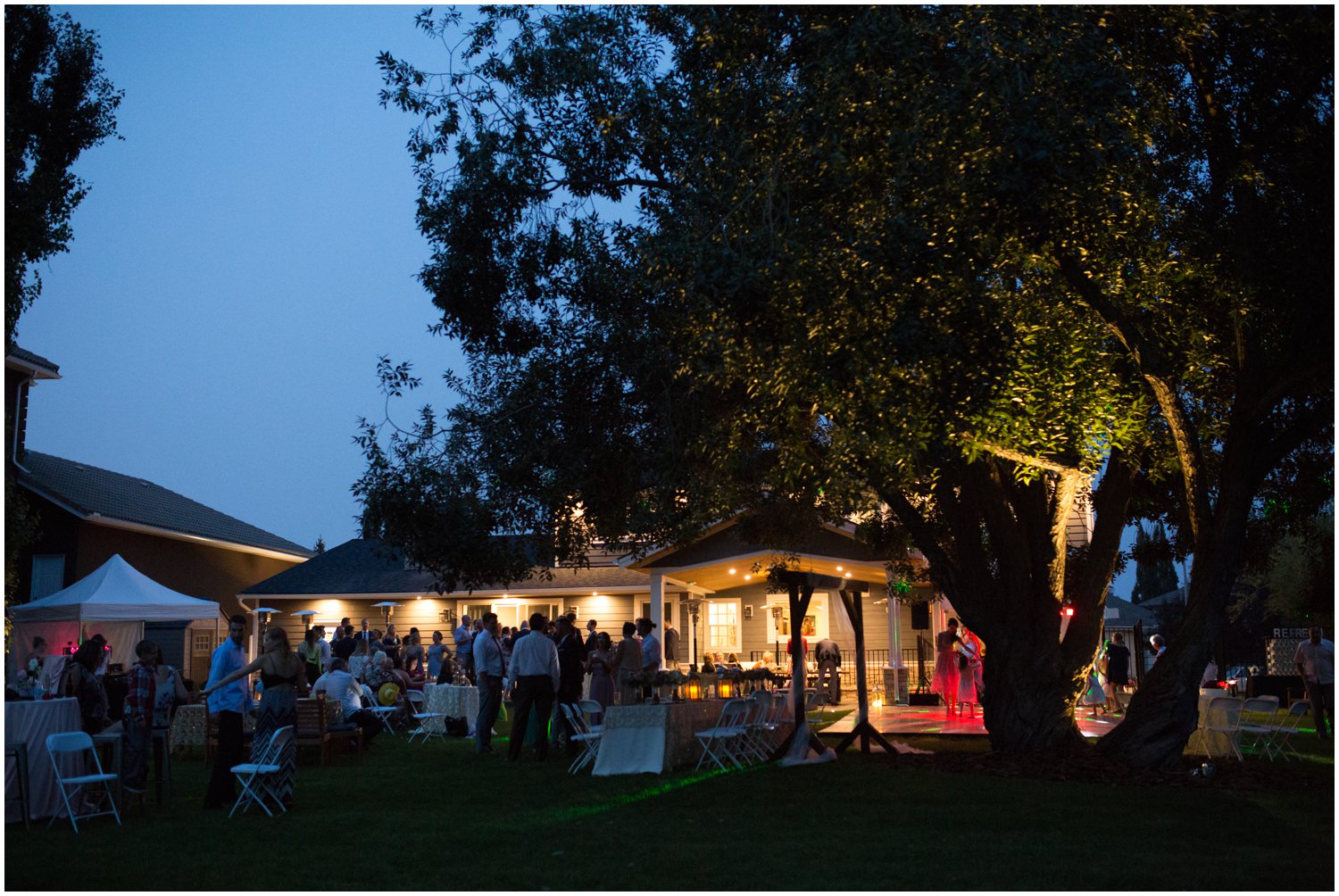 A backyard wedding as the sun sets