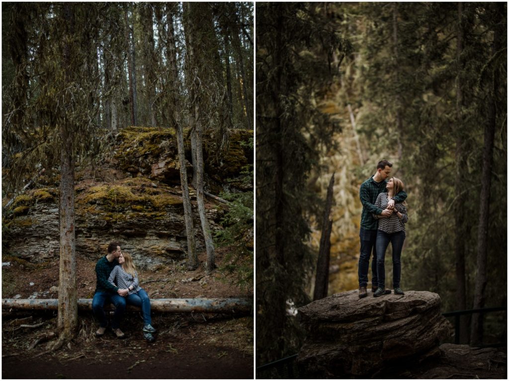 A couple embraces in a forest at Johnston's Canyon in Banff National Park