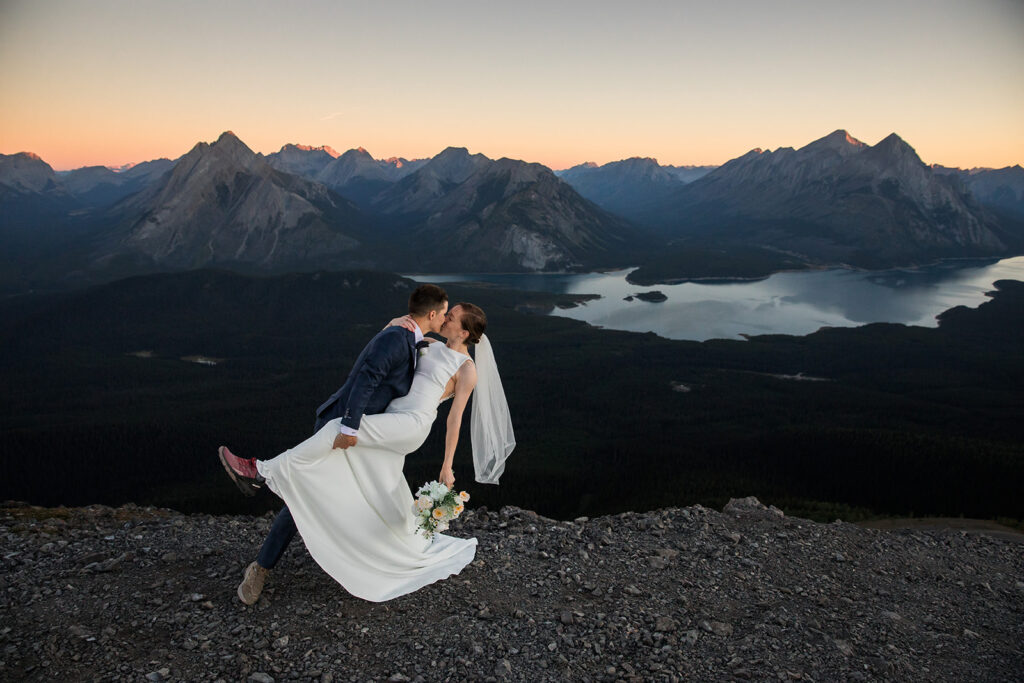 two brides elope at the top of a mountain in alberta